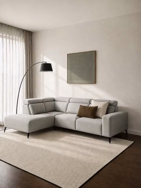 Divano angolare sinistro Calary Kenay Home colore perla con funzione letto e cuscini inclusi