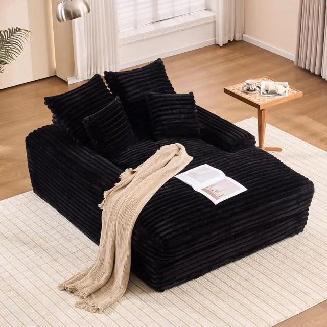 Poltrona chaise longue Mivray in velluto a coste nero con 4 cuscini in memory foam rimovibili e lavabili L/P/H: 63 x 137 x 175 cm