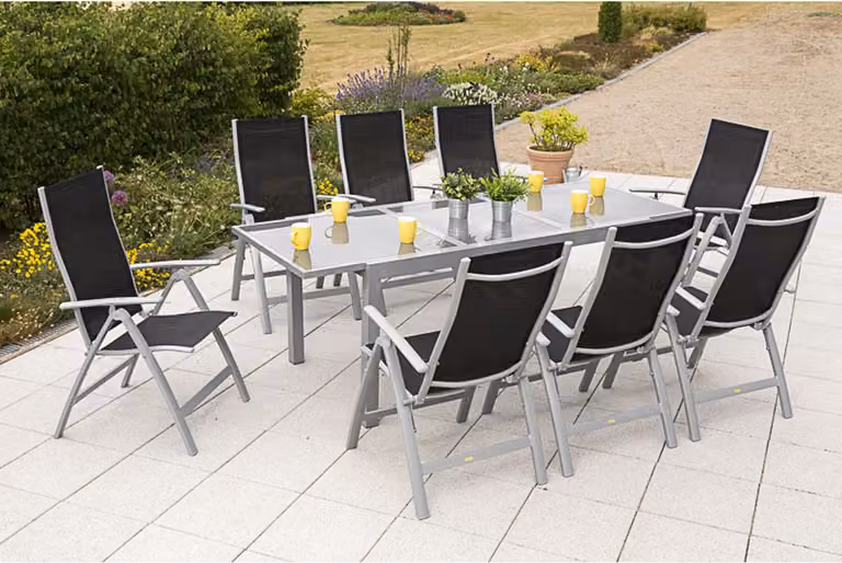 Set di mobili da giardino Merxx "Carrara" 9 pezzi con tavolo allungabile 160/220 x 90 cm - struttura in alluminio argento con rivestimento in tessuto nero