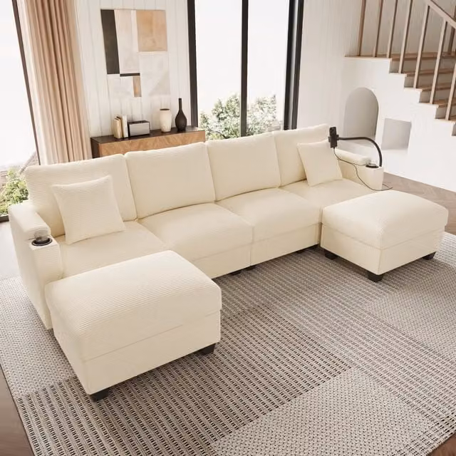 Divano angolare modulare a U REDOM in velluto a coste beige con funzione letto, porta bicchieri e ricarica USB, L/P/H: 275,5 x 139 x 87 cm