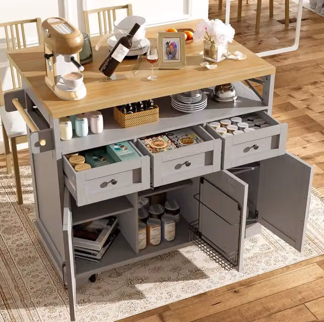 Isola da cucina ULEVR 118x43-80x98 cm con piano ribaltabile, 3 cassetti, ruote e divisori removibili, grigia