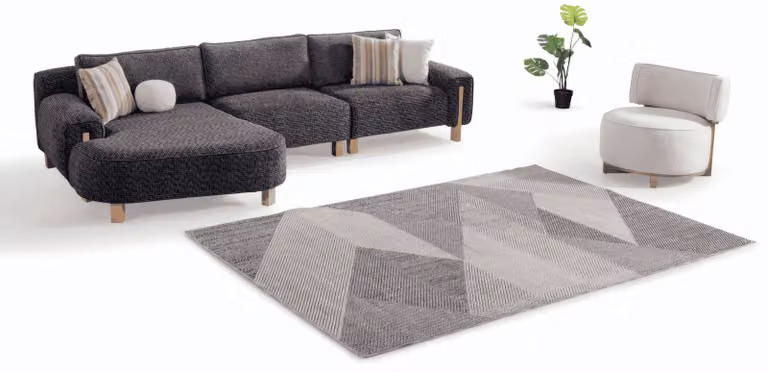 Un divano angolare elegante e spazioso per chi apprezza i dettagli di alta qualità.
