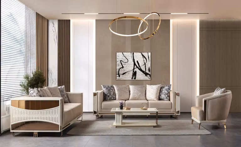 Divano da soggiorno, colore bianco, beige e oro, morbido, confortevole, moderno. Tavolino da caffè