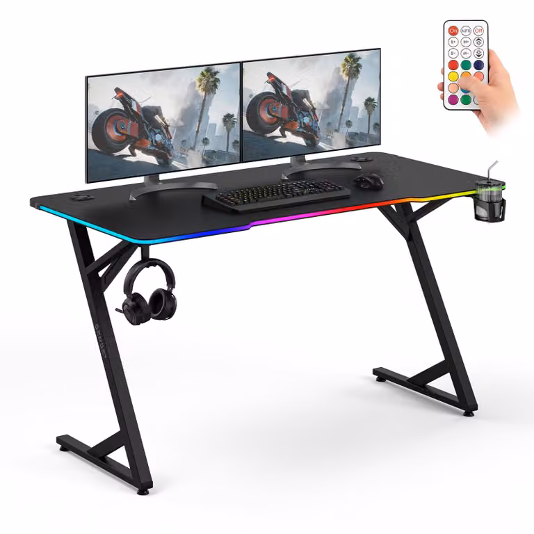 Sense7 VOLT RGB, scrivania da gaming, 140x70 cm, nera, con illuminazione LED, grande, effetto carbonio, ideale per giocatori e per l'ufficio domestico