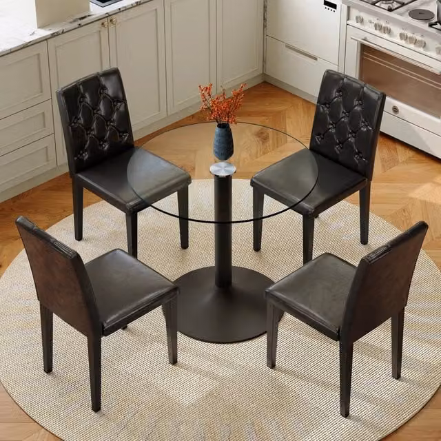Set tavolo rotondo in vetro Ø85 cm con 4 sedie in PU nere