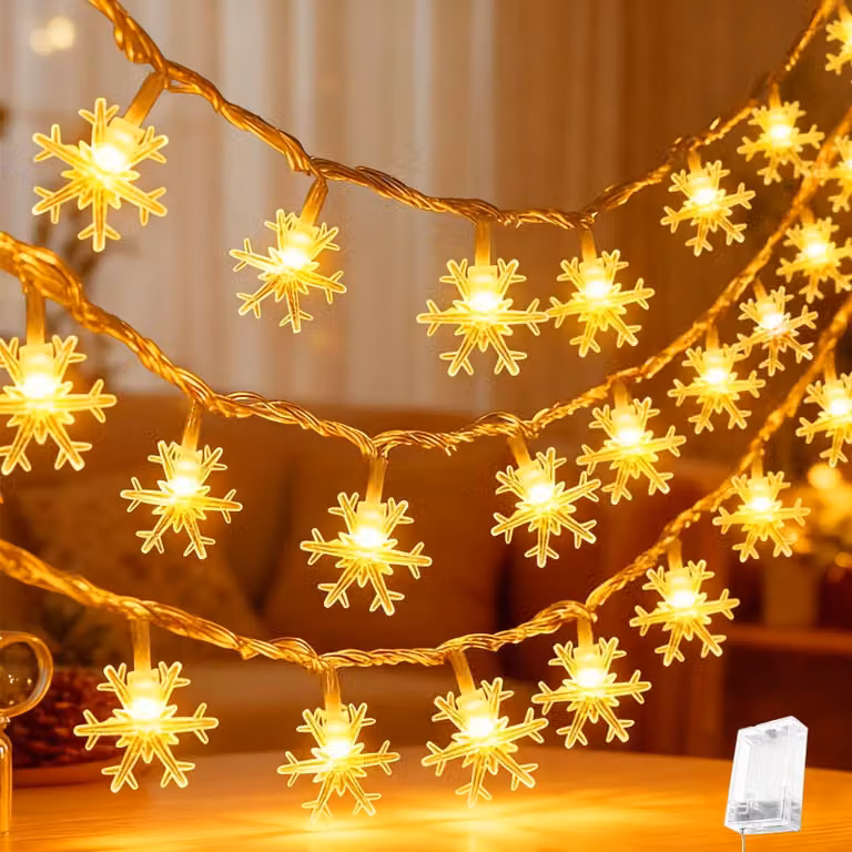 Catena luminosa da 6 metri, con 40 LED a forma di fiocchi di neve, luce bianco caldo, 2 modalità