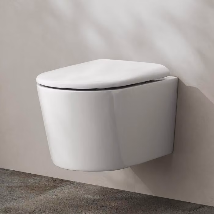Water closet a muro Kronenbach, senza anello di scarico, con sistema di scarico a rotazione e copriwater avvolgente