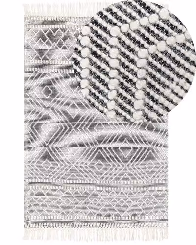 Beliani Tappeto da salotto in lana con frange decorative 160 x 230 cm in bianco e nero