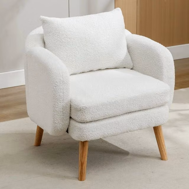 Poltrona Minimal in velluto bouclé bianco con cuscino e gambe in legno per soggiorno e camera da letto