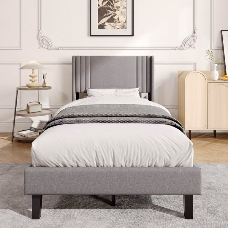 Letto imbottito UnboxG 90x200 cm in lino grigio, morbida testiera ad ali, robusto telaio in metallo con rete a doghe, ampio vano portaoggetti sotto il letto, letto moderno e confortevole per la camera da letto e la camera degli ospiti