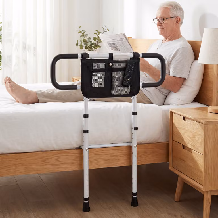 Sponda letto pieghevole e supporto per WC con braccioli imbottiti Costway, colore bianco