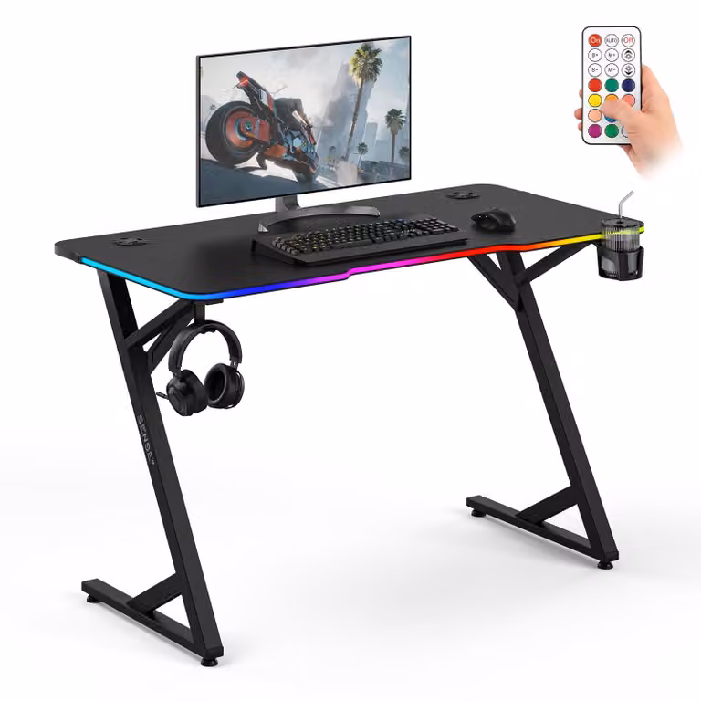 Sense7 VOLT RGB, scrivania da gaming, 120x60 cm, nera, con illuminazione LED, scrivania per computer, design effetto carbonio, scrivania da gaming, con portabicchieri