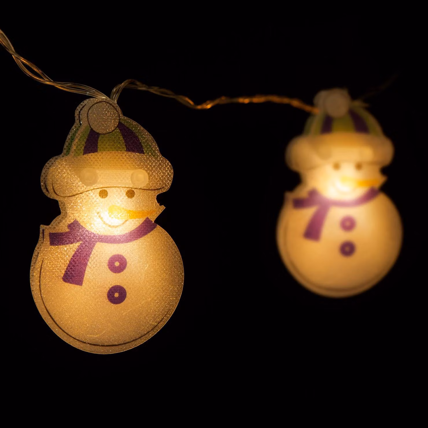 Catena luminosa a LED - Pupazzo di neve - 10 LED - 1,35 metri - Luce bianco caldo - Alimentazione: 2 batterie AA