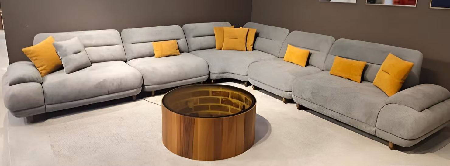 Graues Wohnzimmer L-Form Sofa Designer Polstercouch Textil Ecksofa