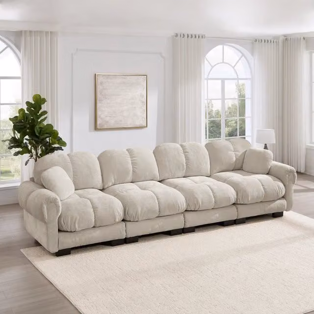 Divano modulare a L MIVRAY in tessuto beige con cuscini e connettori a clip per soggiorno