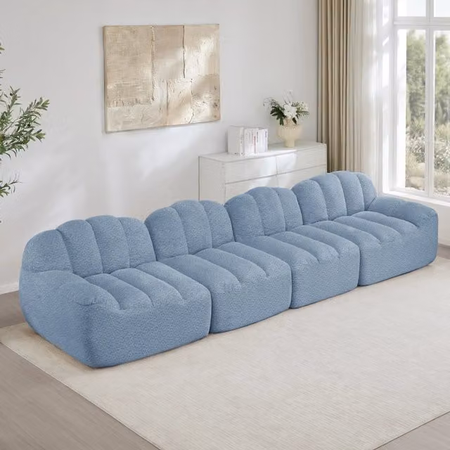 Divano modulare angolare senza struttura in fleece granulare blu; seduta profonda