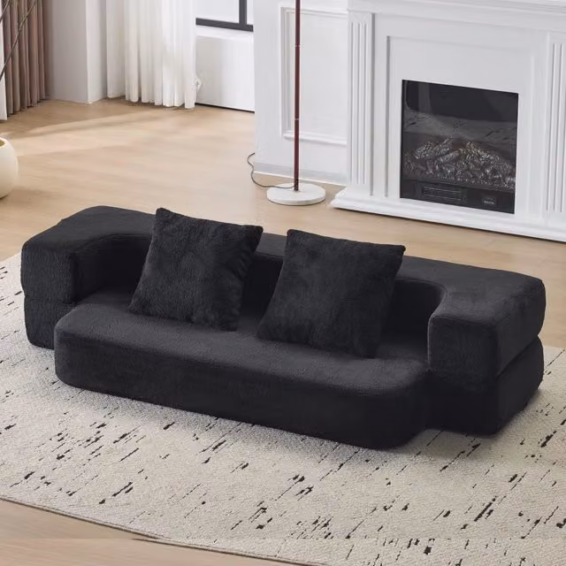 Divano letto a due posti OKWISH in tessuto nero con funzione notte e cuscini inclusi