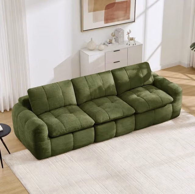 Divano modulare senza struttura; design trapuntato a griglia; chenille verde
