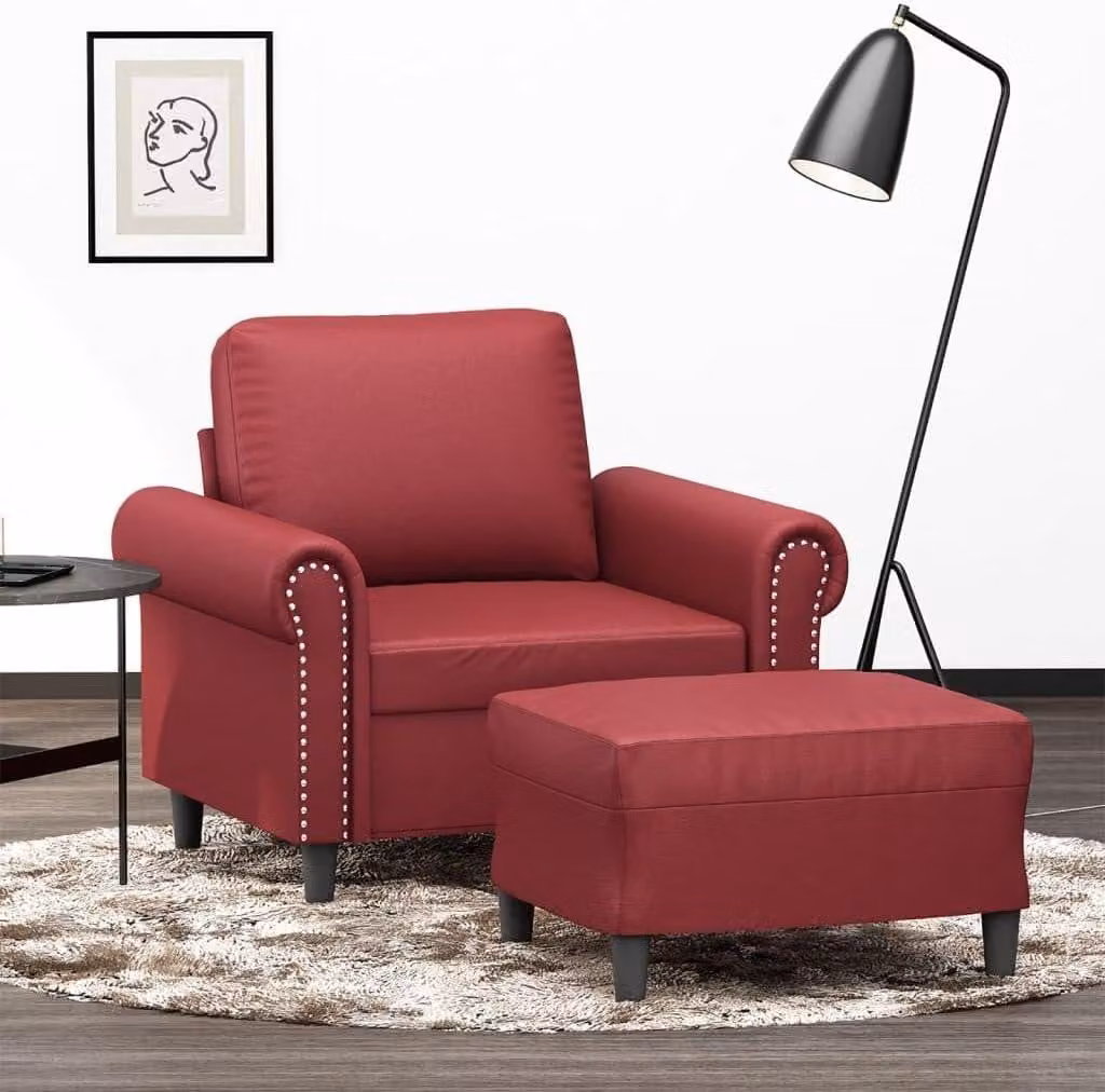 Poltrona rossa in ecopelle con poggiapiedi, larghezza seduta di 60 cm, struttura robusta e imbottitura confortevole, ideale per il soggiorno e il relax
