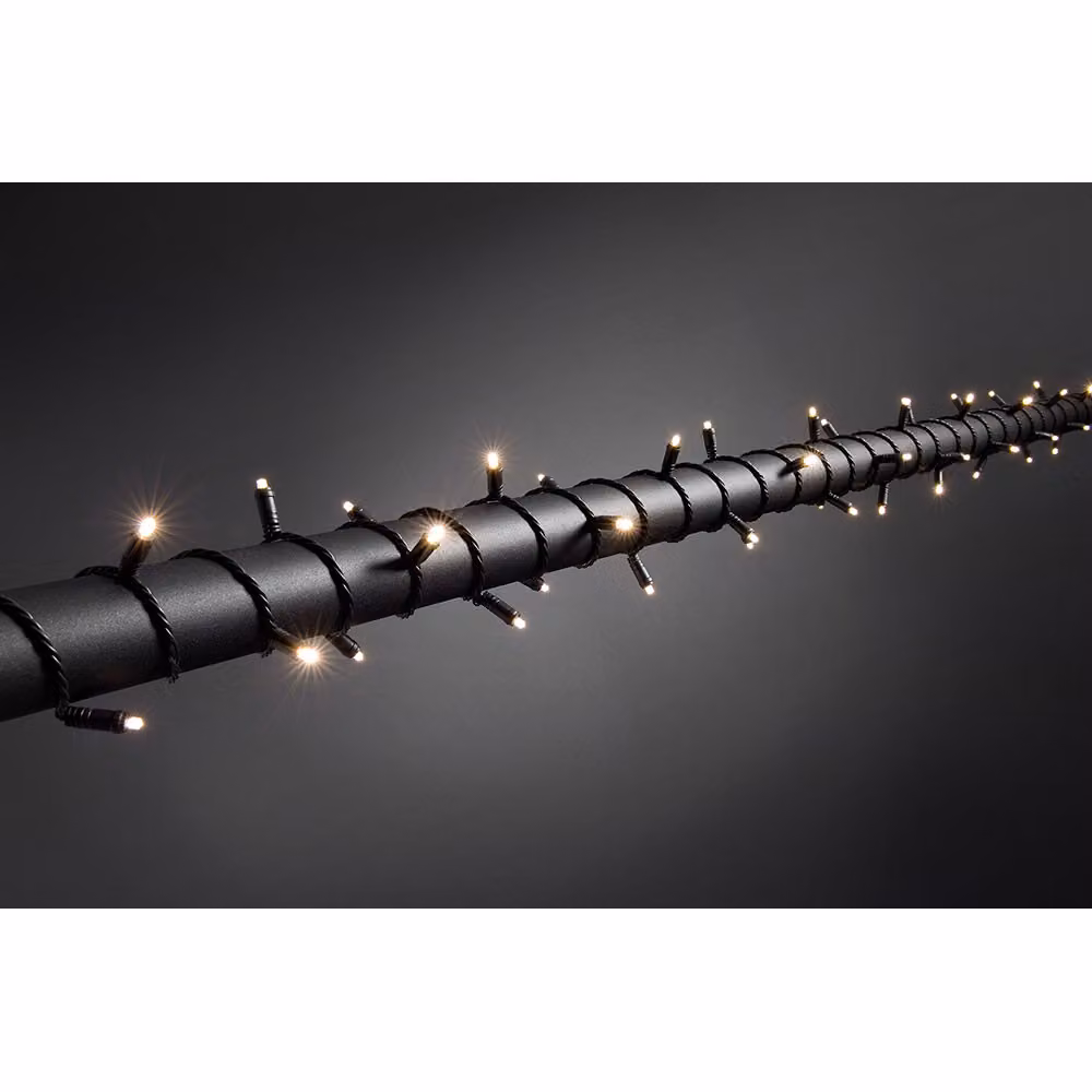 Konstsmide - Micro luci LED da fata, con dimmer, isolate/incapsulate, IP67, 80 diodi bianchi caldi, trasformatore per esterni da 24 V, cavo morbido nero ; 6621-117