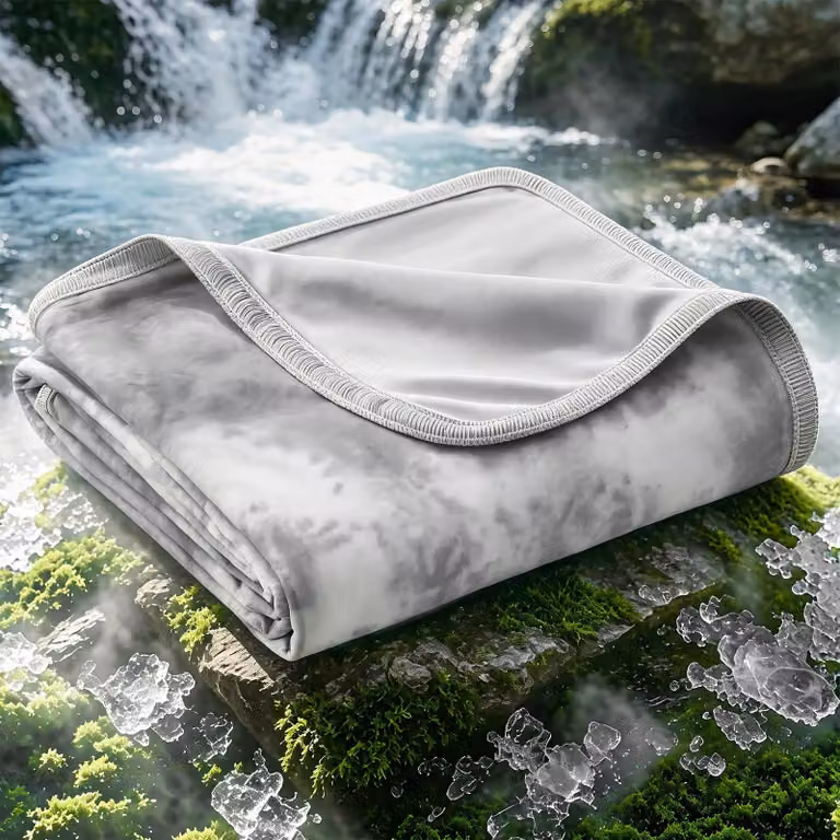 Coperta refrigerante 228x228 cm, realizzata con fibra Arc-Chill, con indice di raffreddamento Q-Max di 0,5, ideale per l'estate