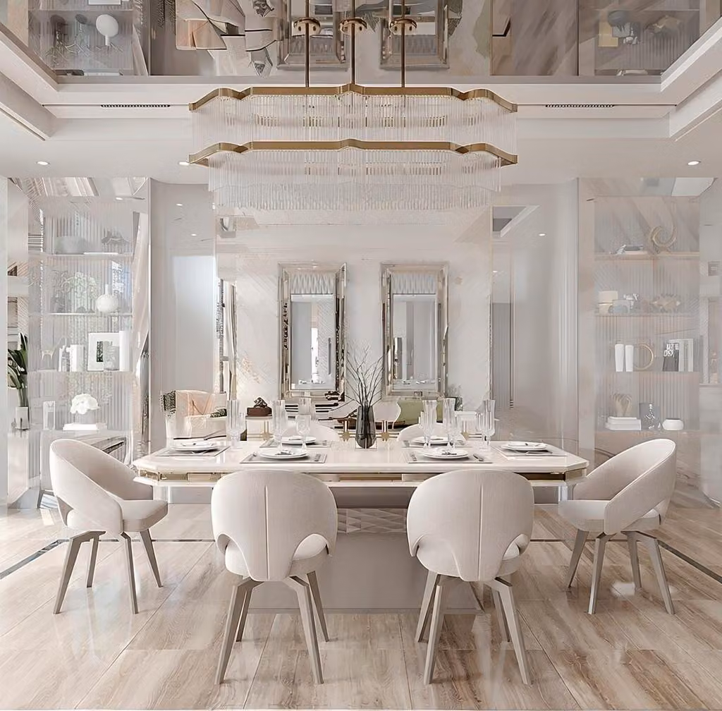 Set da pranzo con tavolo, sedie e decorazioni dorate