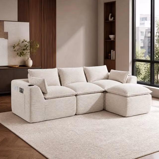 Divano modulare 3 posti 256x161x75 cm in tessuto beige, con pouf, per soggiorni piccoli –