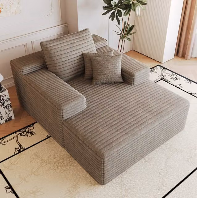 Divano chaise longue ULEVR in tessuto a coste color cammello, con struttura in schiuma elastica, senza montaggio
