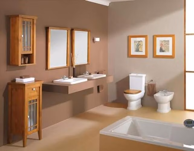 Copriwater in legno con sistema di chiusura ammortizzata e finitura in legno di noce