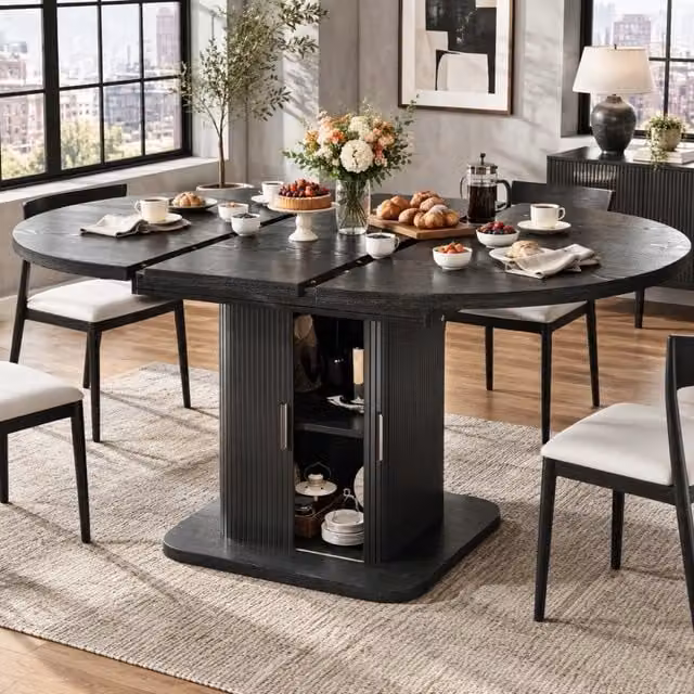 Tavolo da pranzo ovale allungabile con spazio contenitivo, 110–149,8 cm, ante scorrevoli e ripiano estraibile, disponibile in noce o nero