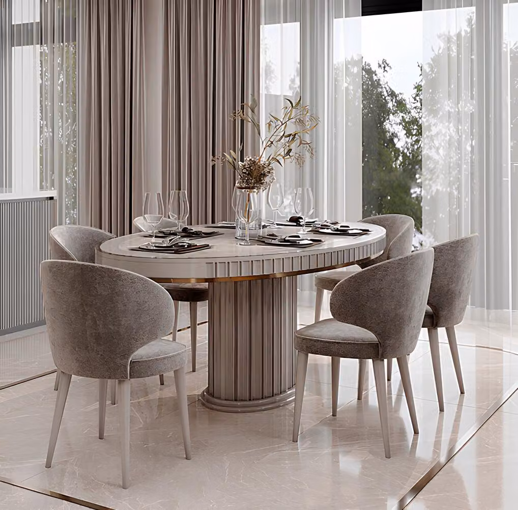 Set da pranzo beige con 6 sedie e dettagli dorati per una casa moderna