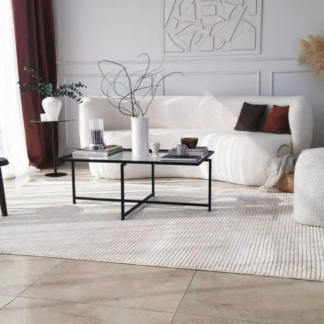 Tavolino da salotto Anna DMORA con piano in vetro nero e trasparente, L: 94 cm, P: 64 cm, H: 35 cm – 1