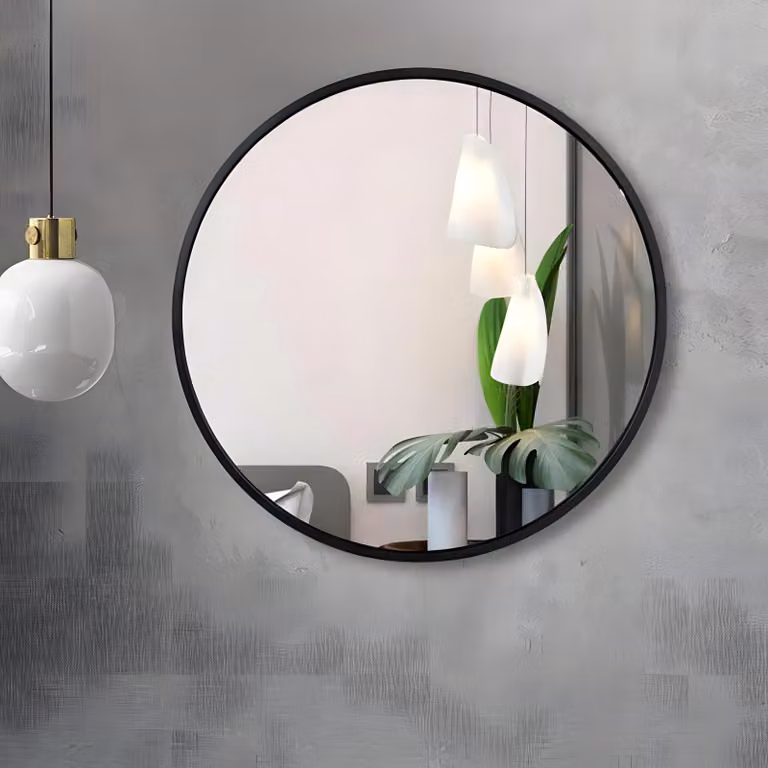 Specchio da parete rotondo in stile loft con elegante cornice nera