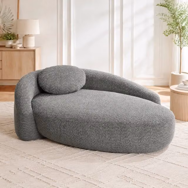 Sofa minimalista in tessuto Teddy; design arrotondato; grigio scuro