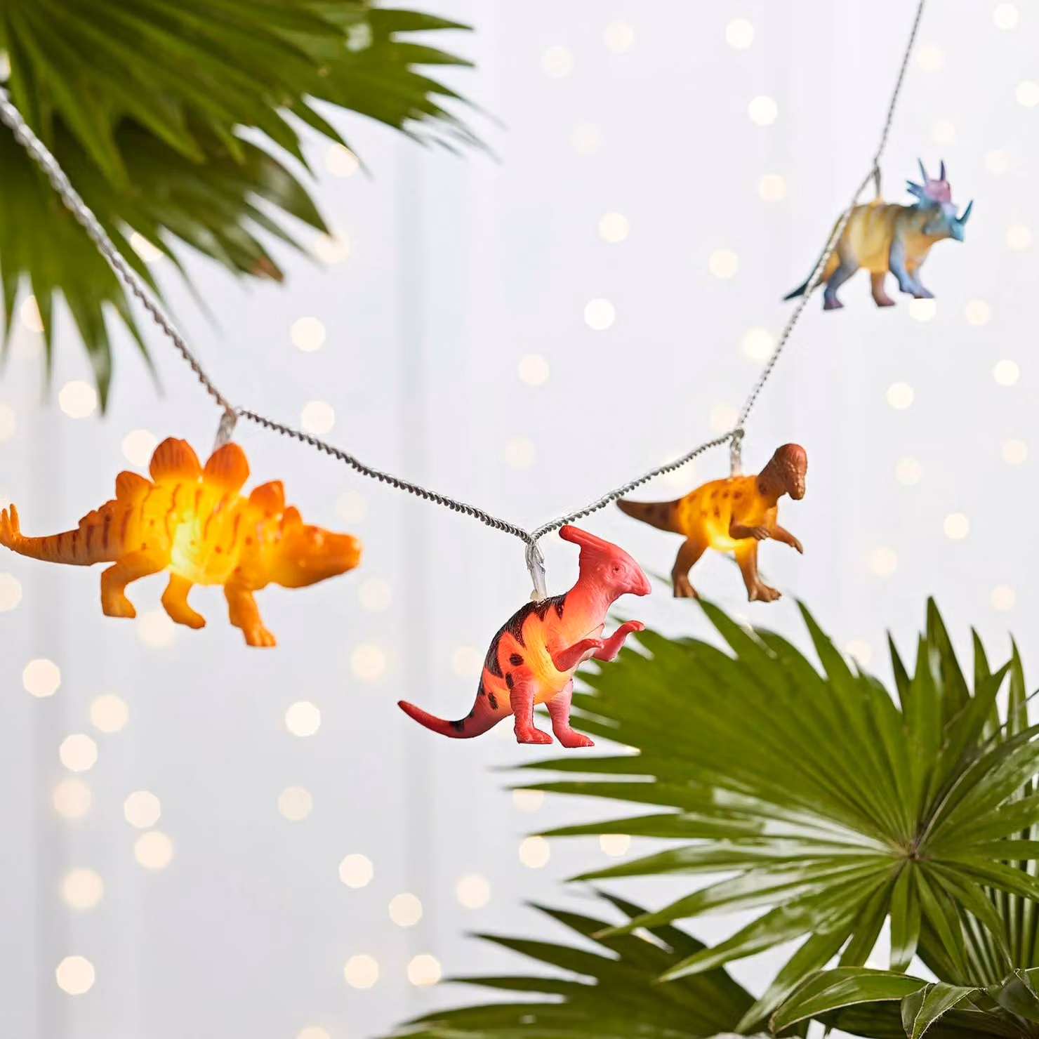 Catena luminosa a tema dinosauri, con 12 LED bianco caldo, timer integrato, lunghezza 2,2 metri