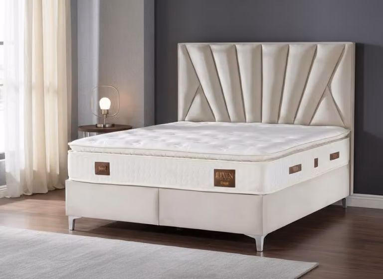 Letto matrimoniale con materasso ergonomico per un sonno ristoratore