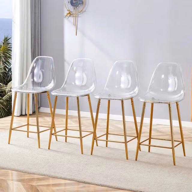 Sgabello da bar moderno Mivray con seduta trasparente in plastica e struttura in metallo dorato per cucina e soggiorno L: 48,0 cm, P: 47,0 cm, H: 68,5 cm