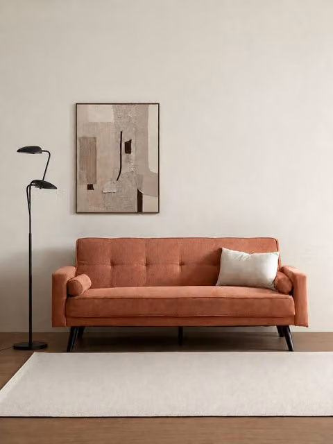 Divano letto Dallas Kenay Home color terracotta con funzione click-clack e cuscini inclusi