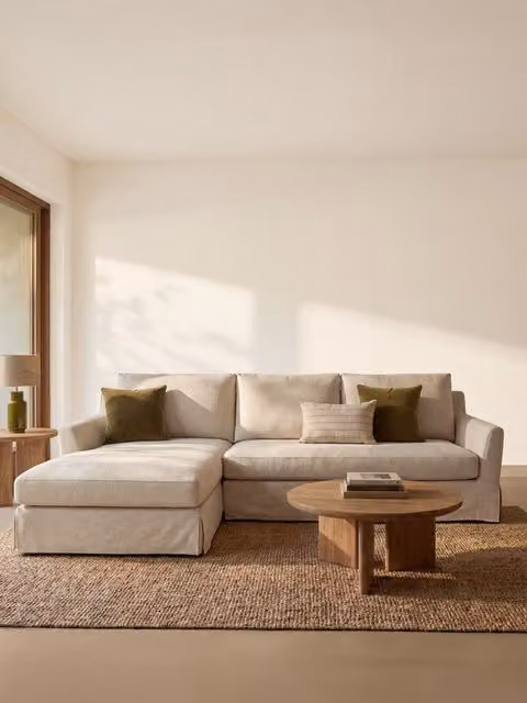 Divano con chaise longue sinistra Oreane Kenay Home, colore beige, con coperture sfoderabili in tessuto