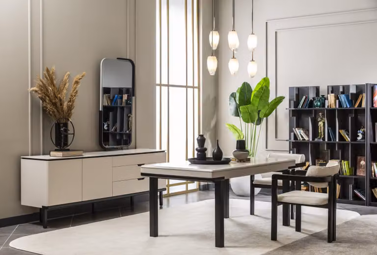 Set da pranzo beige e nero, composto da tavolo da pranzo, credenza e altri mobili moderni