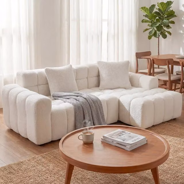 Divano angolare convertibile a L; stile moderno; colore bianco