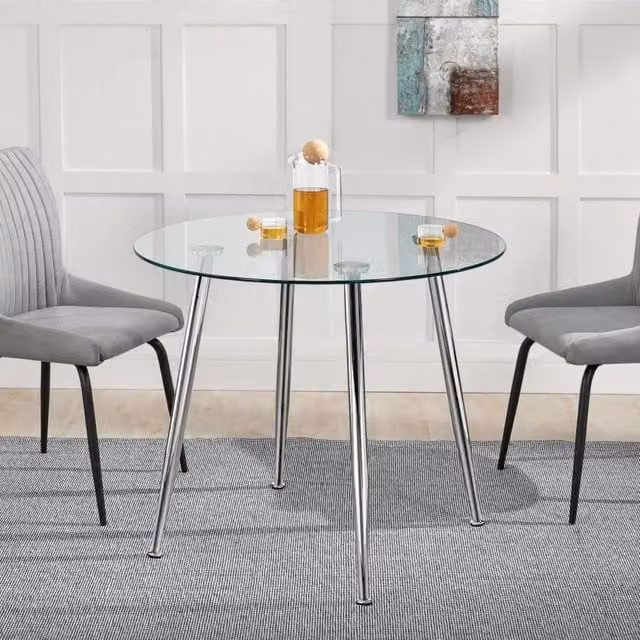 Tavolo rotondo moderno Humppila en.casa con piano in vetro trasparente e gambe in acciaio cromato, Diametro: 80 cm, Altezza: 75 cm – 1