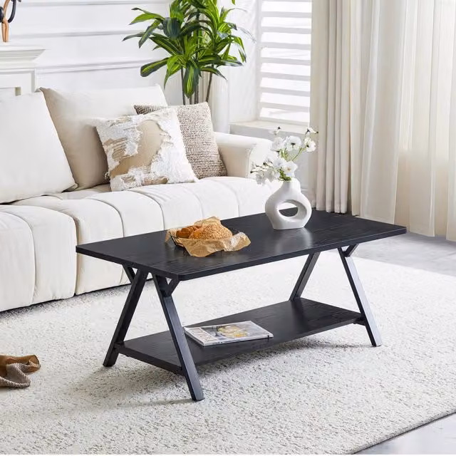 Tavolino da salotto REDOM in stile industrial nero con ripiano in MDF e metallo L: 110 cm, P: 57 cm, H: 44,5 cm