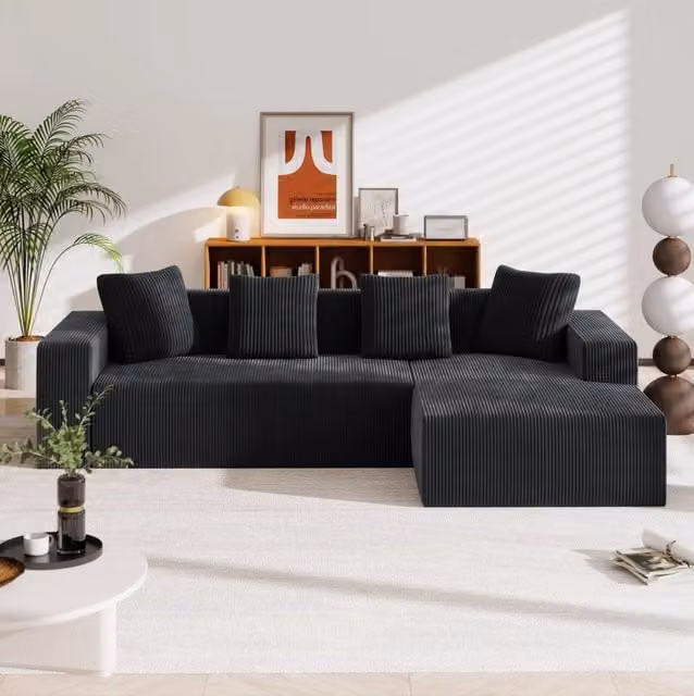 Divano modulare 261x146x65 cm con seduta profonda in velluto a coste nero