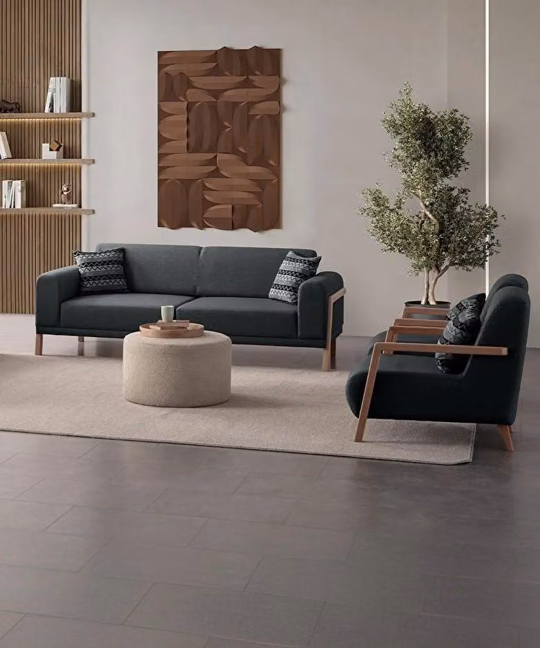 Inspirierendes Design: stilvolles Sofa und Sessel für einen gemütlichen Raum