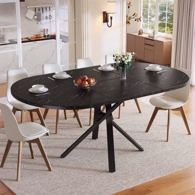 Tavolo rotondo allungabile 100-140 cm effetto marmo con struttura a X nera