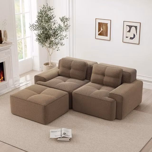 Divano modulare con seduta profonda e design componibile in corduroy marrone