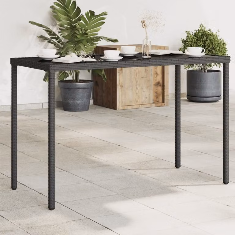 Maison Exclusive - Tavolo da giardino con piano in vetro nero 115x54x74 cm Poly Rattan
