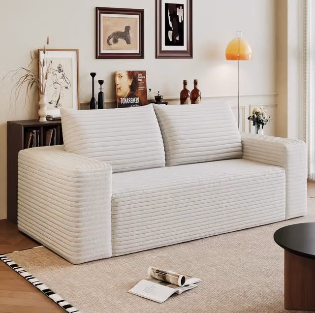 Divano modulare in tessuto color bianco crema; senza montaggio