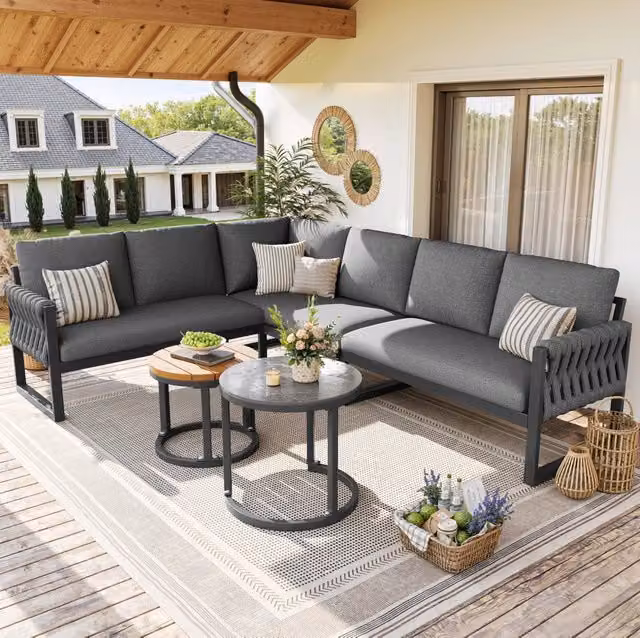 Set salotto da giardino modulare a forma di L con struttura in acciaio e cuscini in tessuto outdoor grigio – 1